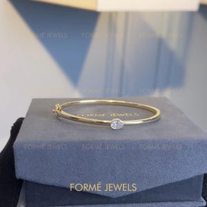 0.75 Carat Oval Moissanite Solitaire Bezel Bracelet, East West Dainty Gold Cuff, Stacking Jewelry