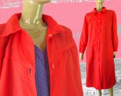 Vintage red plastic raincoat, bright red mackintosh
