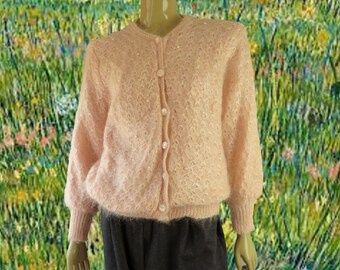 fuzzy pink cardigan sweater