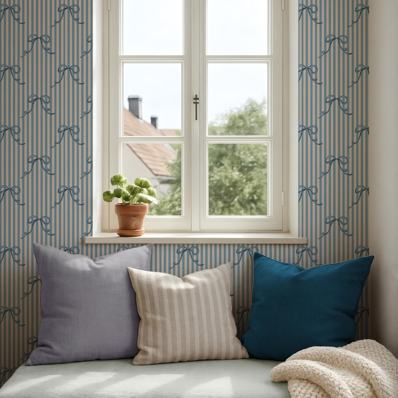 Pirouette Blue Bow Wallpaper with Candy Stripe and Hand Drawn Ribbon by Oh SO Daisy in a Soft Feminine Window Bench