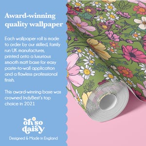 The image is an advertisement for a quality wallpaper product, featuring a close-up of a floral pattern on a roll of wallpaper.