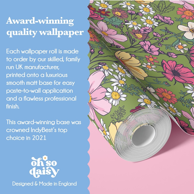 The image is an advertisement for a quality wallpaper product, featuring a close-up of a floral pattern on a roll of wallpaper.