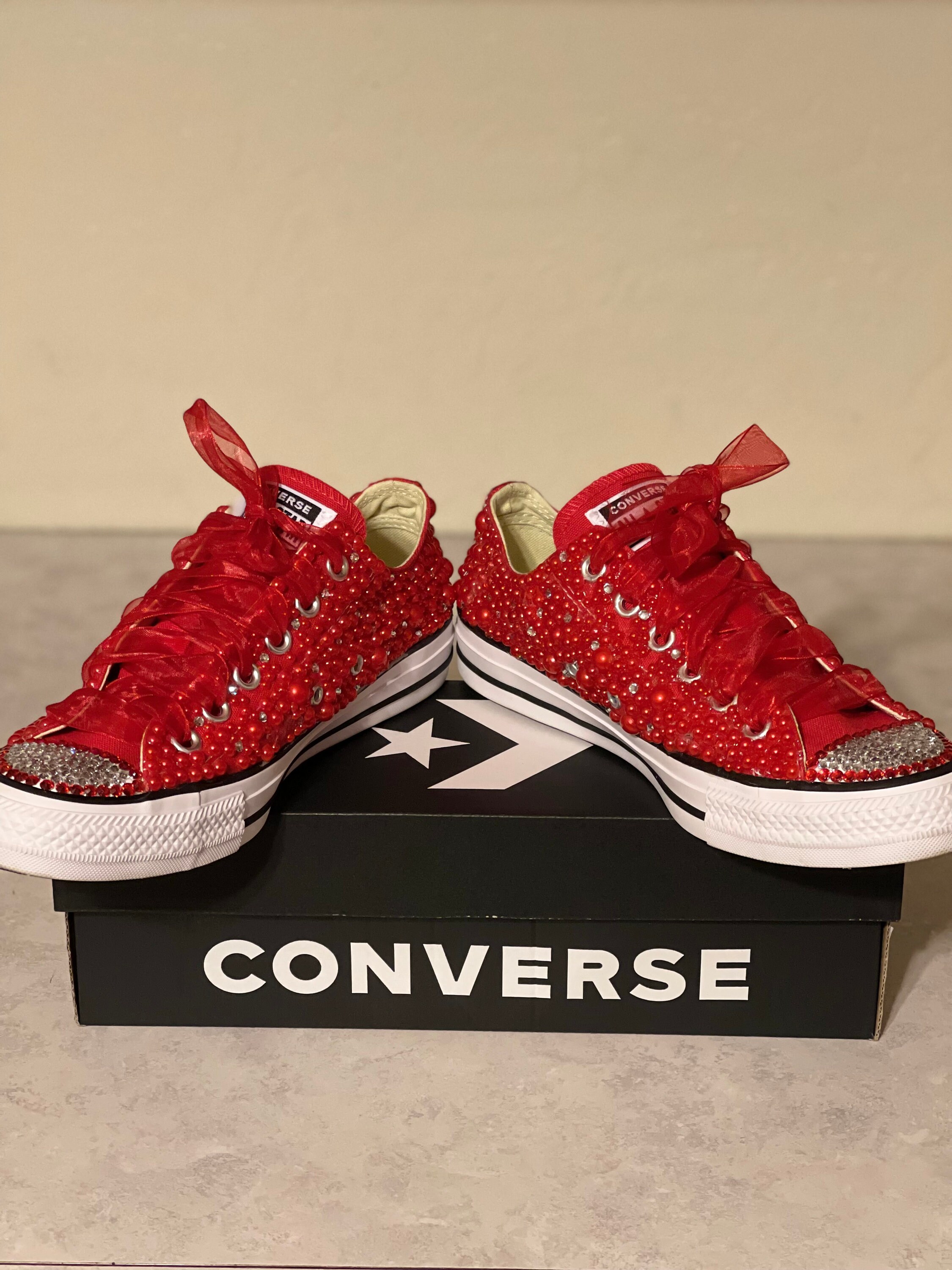 red sparkly converse