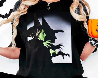 La Strega Bionda Con La Zucca E Il Gatto Nero. Concetto Di Halloween Pronto Per Slogan O Prodotto Testo Poster 157397412