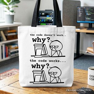 Bolso de tela con el lema "¿Por qué funciona el código?", divertido regalo para programadores y amantes de la programación.
