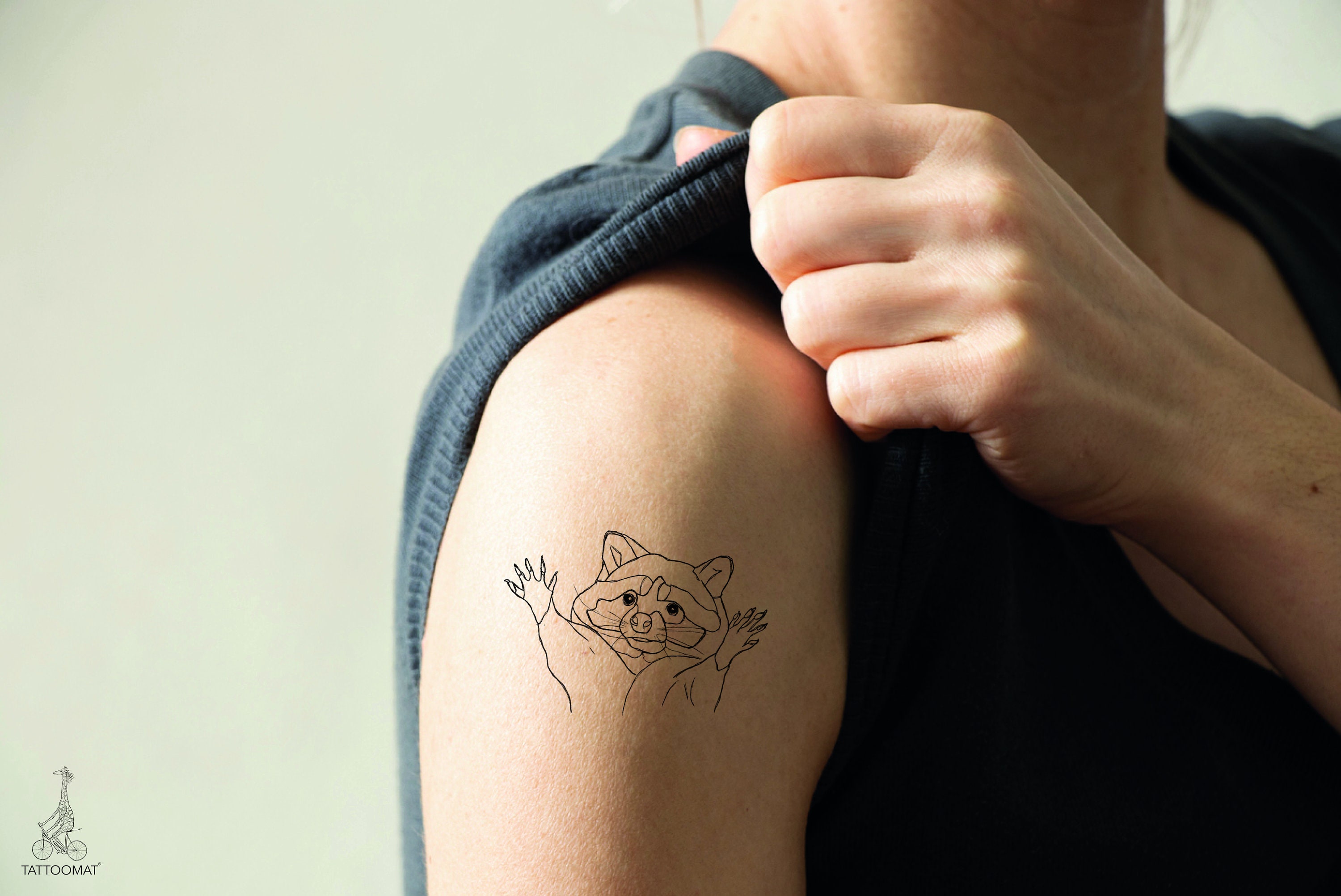 Simple racoon tattoo