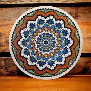 MP18 Rust, blue, green and yellow mandala with white border trivet / mouse pad