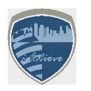 Puede incluir: Un diseño en forma de escudo azul y gris con una silueta de ciudad y la palabra "creer" en texto blanco.