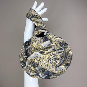 Reversible Japanese Knot Bag | Wave Print Cotton & Black Duchess Satin | Handmade Wrist Bag | Small Fabric Purse | Gift for Her