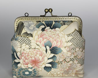 Traditional Floral Kimono Pattern Clutch with Gold Details: Timeless Elegance and Cultural Richness