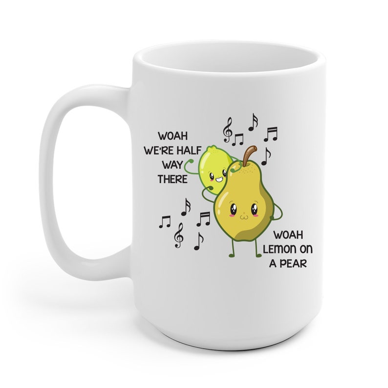 May include: White ceramic mug with a whimsical design featuring a cartoon lemon and pear embracing, surrounded by musical notes. The text on the mug reads "Woah We're Half Way There" and "Woah Lemon on a Pear".