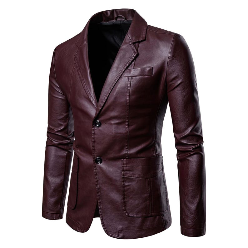 May include: A burgundy leather blazer with a two-button closure, notched lapels, and two front pockets. The jacket has a classic, tailored fit and a smooth, polished finish. The blazer is a stylish outerwear option.