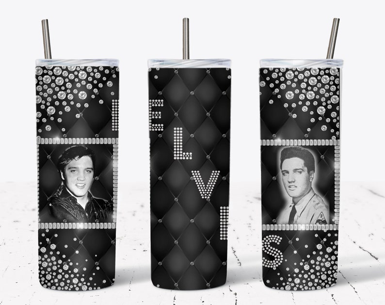 May include: A black and white tumbler featuring images of Elvis Presley. The tumbler has a diamond pattern with the name "ELVIS" spelled out in white rhinestones. Rhinestone accents and a silver straw complete the design.