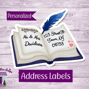 May include: Personalized address labels featuring an open book with a quill pen, hearts, and the text "Mr. & Mrs. Davidson 123 Street St. Town, NJ 08753".