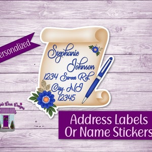 May include: Personalized address label sticker with a parchment scroll design. The label features a blue pen, blue and gold flowers, and the text "Stephanie Johnson 1234 Street Rd. City, NJ 12345".
