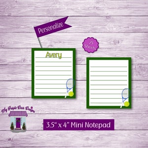 May include: A personalized 3.5" x 4" mini notepad with a green border and lined paper. The notepad features a tennis racket and ball graphic. The notepad is customizable with a name, in this case, "Avery".