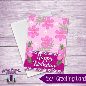 May include: A pink and white floral greeting card with the text "Happy Birthday" in a white script font. The card is 5x7 inches.