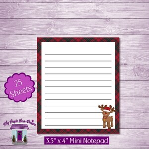 May include: A red and black plaid mini notepad with a cute reindeer illustration. The notepad has 25 sheets and measures 3.5 inches by 4 inches.