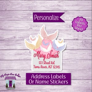 May include: A set of 20 personalized address labels featuring a pink envelope with white wings and the text "Mary Smith, 123 Street Rd., Toms River, NJ 12345".