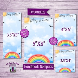 May include: Handmade notepads with a sky and rainbow design. The notepads are available in various sizes, including 3.5"x8", 5"x8", 4"x6", and 3.5"x4". Each pad contains 25 sheets. The brand name "Amy Peters" is displayed.