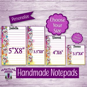 May include: Handmade notepads with a Day of the Dead theme. Each notepad features a colorful sugar skull design and is available in various sizes, including 5"x8", 3.5"x8", 4"x6", and 3.5"x4". The notepads are personalized and contain 25 sheets each.
