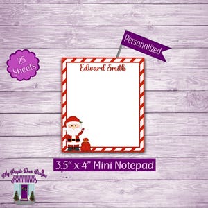 May include: A personalized 3.5" x 4" mini notepad with a red and white candy cane striped border. The notepad features a cartoon image of Santa Claus holding a bag of gifts. The notepad has 25 sheets and says "Edward Smith" at the top.