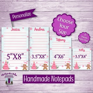 May include: Handmade notepads in various sizes, personalized with names. Each notepad features a pink Christmas tree and gingerbread man design. Sizes include 5"x8", 3.5"x8", 4"x6", and 3.5"x4". The notepads have 25 sheets each.