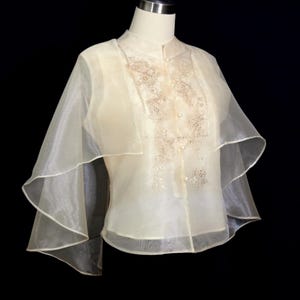 Cape/poncho habillé beige brodé femme Barong et ourlet échancré n° 5760