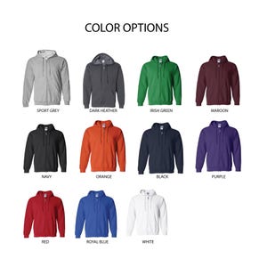 a bunch of different colored hoodies on a white background