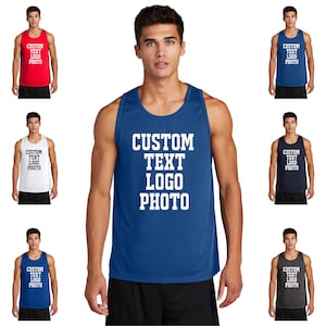 May include: A collection of sleeveless athletic tank tops in various solid colours including red, blue, white, navy, and charcoal grey. Each tank top features the white text CUSTOM TEXT LOGO PHOTO printed in a bold, block font on the chest area.