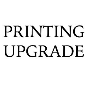 May include: A white rectangular graphic featuring the black text PRINTING UPGRADE centered in a clear, bold, serif font. The design consists of two lines of text with the word PRINTING on the top line and the word UPGRADE on the bottom line.