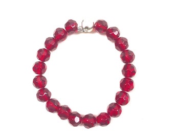 Pulsera de calavera de plata antigua con cuentas de vidrio rojo rubí