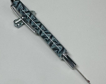 Descosedor cromado con una sola hoja pequeña