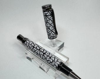 Bolígrafo roller ejecutivo artesanal en metal de cañón con capuchón magnético