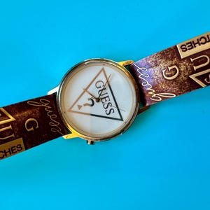 VTG Guess Mother of Pearl Dial Round Silver Tone Case Brown Leather Band Watch GUESS Stainless Steel Case Round Wristwatches for sale | eBay main image 2