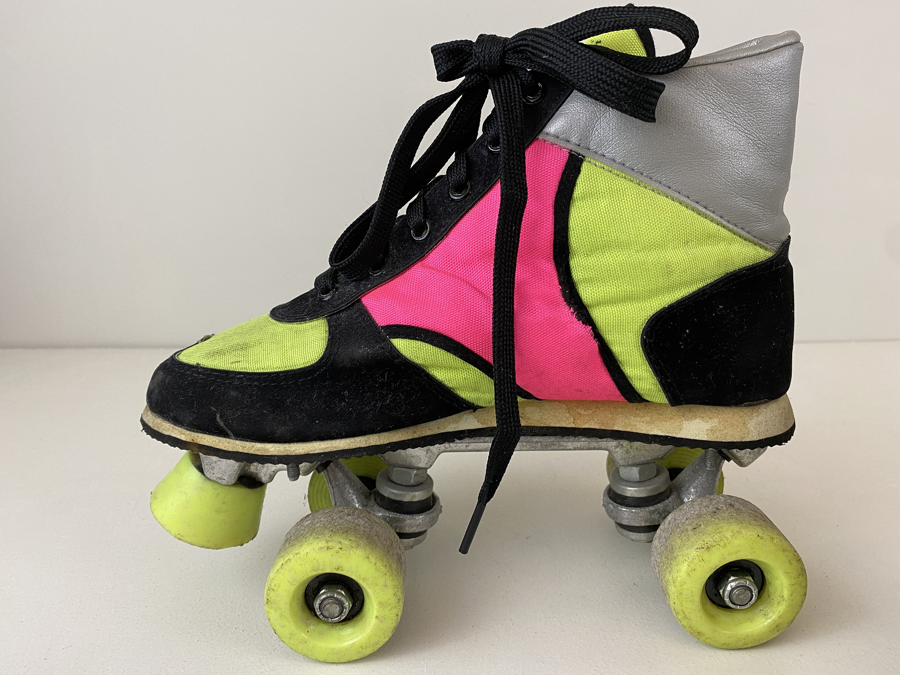Vintage 80s Retro Roller Skates Black, Neon Yellow, Silver Vintage 80s Retro Roller Skates Black, Neon Yellow, Silver