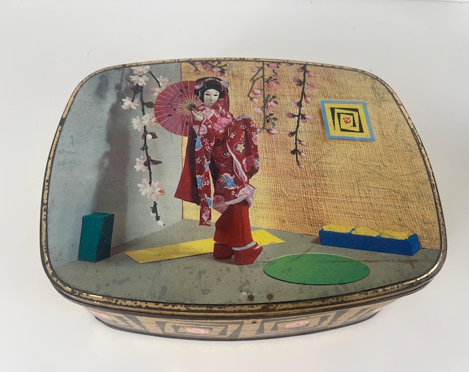 Large storage kitchen tin with a rare, surreal decor with a geisha, from the 1960s