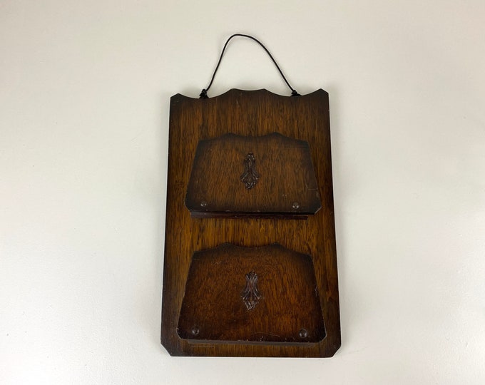 Wooden wall paper holder from the 1950's, mid century modern design