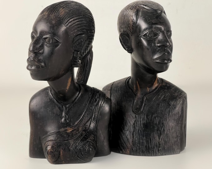 Beautiful vintage African wood carving of a man and woman. Ebony wood from the 1970s
