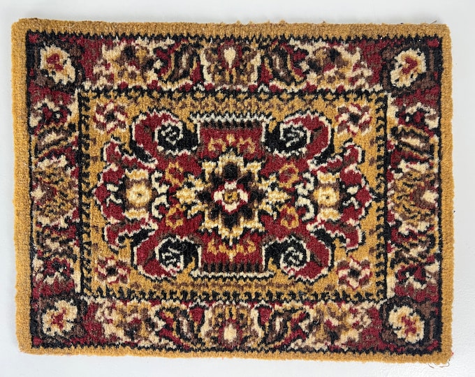 Small oriental style rug, small carpet, table topper, made of wool, red, black, beige and off white accents, 1960s