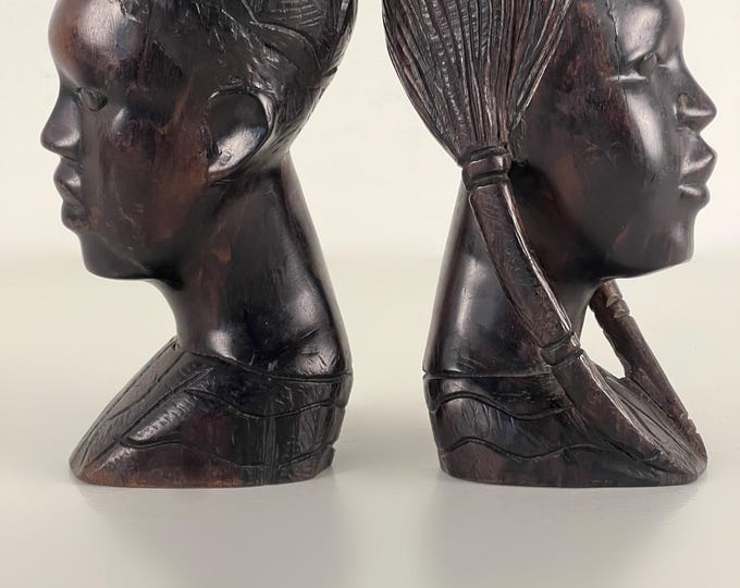 Vintage carved African heads, boy and girl, man woman, ebony wood from the 1970s