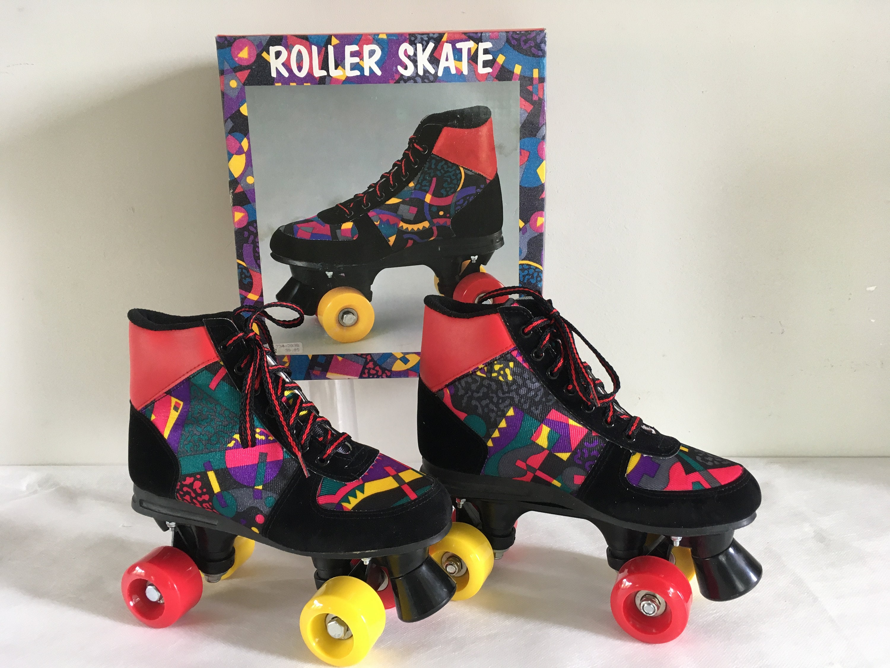 Vintage 80's Retro Roller Skates Black, Red and Disco Colors Vintage 80's Retro Roller Skates Black, Red and Disco Colors