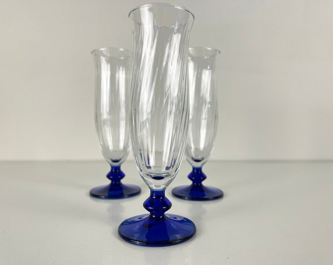 Set of 3 vintage champagne, sparkling wine, prosecco glasses, flutes, cobalt blue stem ribbed chalice, mcm barware from the 1970s