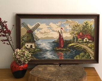 Framed cross stitched retro embroidery painting, romantic landscape with windmill, sailboat and farm, mid century