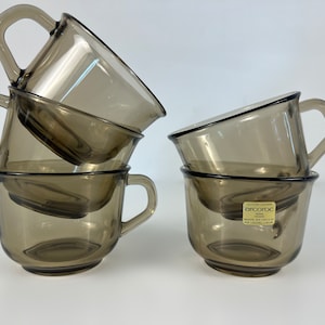 Set of 4 or 5 large smoke glass coffee cups, Arcoroc France, lovely mid century design from the 1970&#39;s