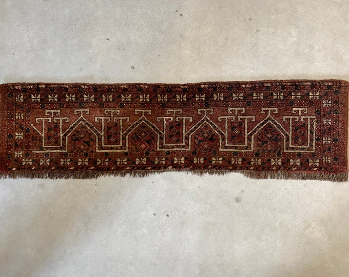 Oriental table rug, small carpet, table topper, wall carpet, black, brown, red and off white accents from the 1960s