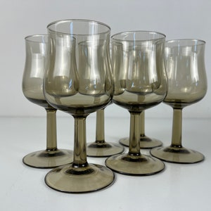 Set of 6 Arcoroc France smoked glass wine glasses, mid century modern barware from the 1970s