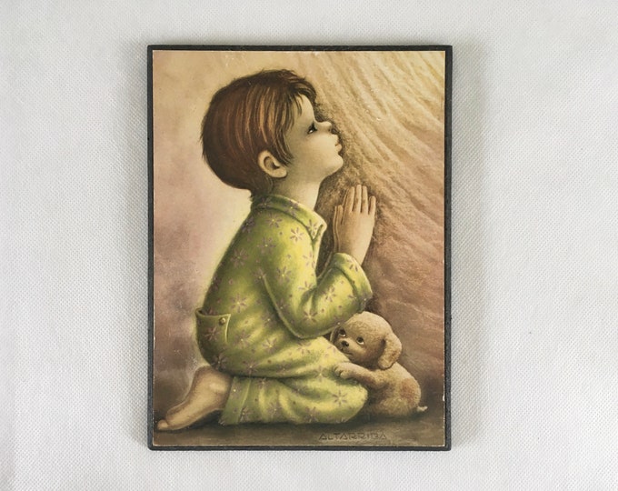 Vintage cute praying little boy on hardboard by Altaribba 1970s.