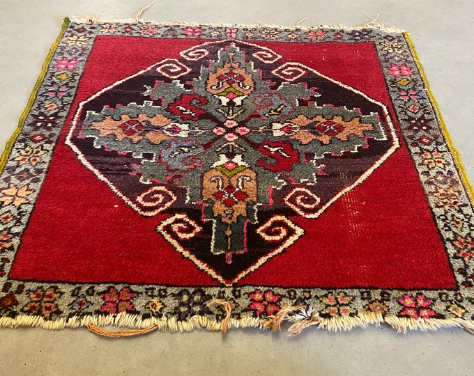 Small colorful oriental rug in red, old pink, purple, brown, green and more, hand made vintage from the 1970s