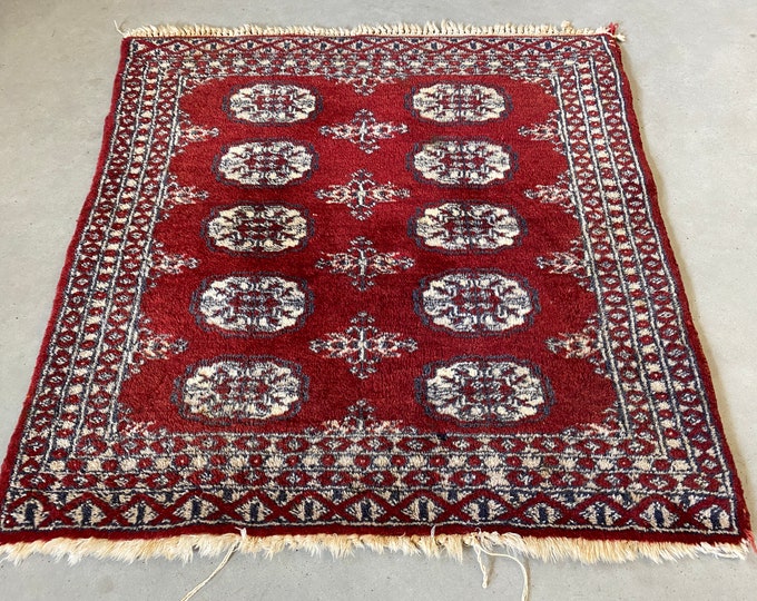 Oriental table rug, table topper, burgundy red, off white and blue, hand knotted, made of wool, 1960s Mid century modern